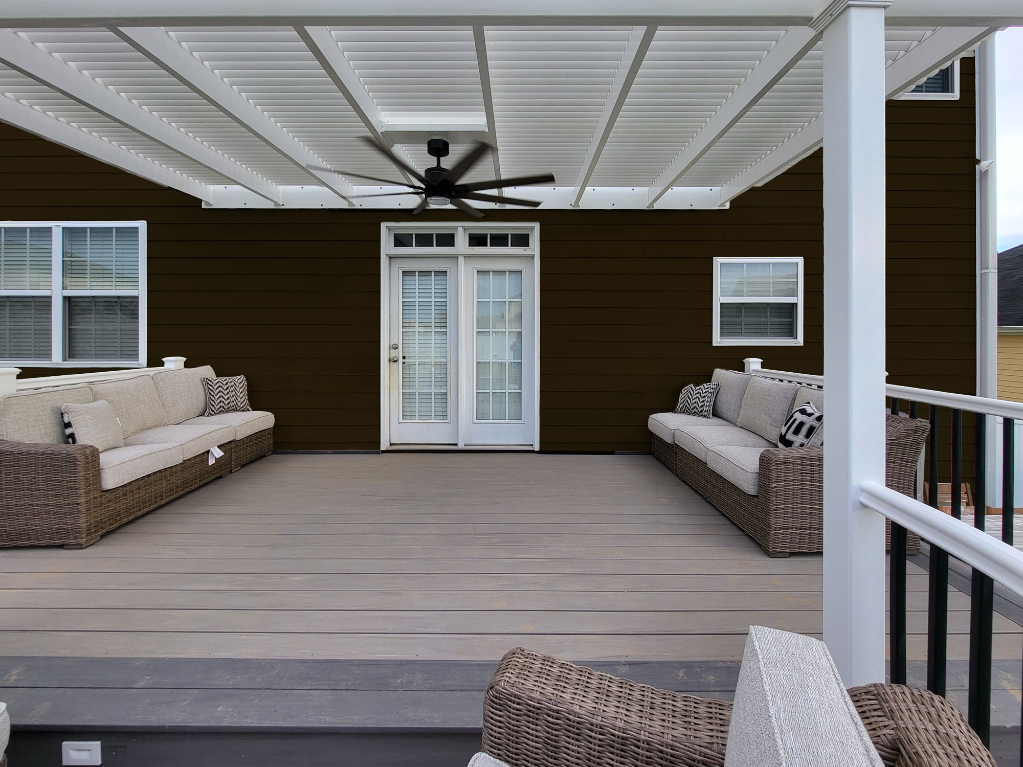Deck pergola with a outdoor ceiling fan