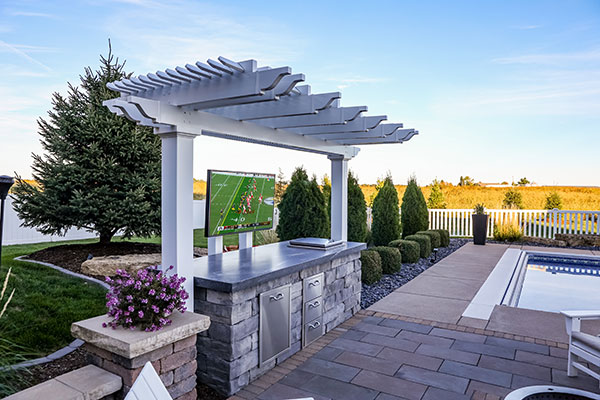 Pool Pergola Arbor over an outdoor tv set and grill