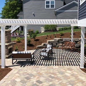 50% shade pattern on the patio under a shade pergola