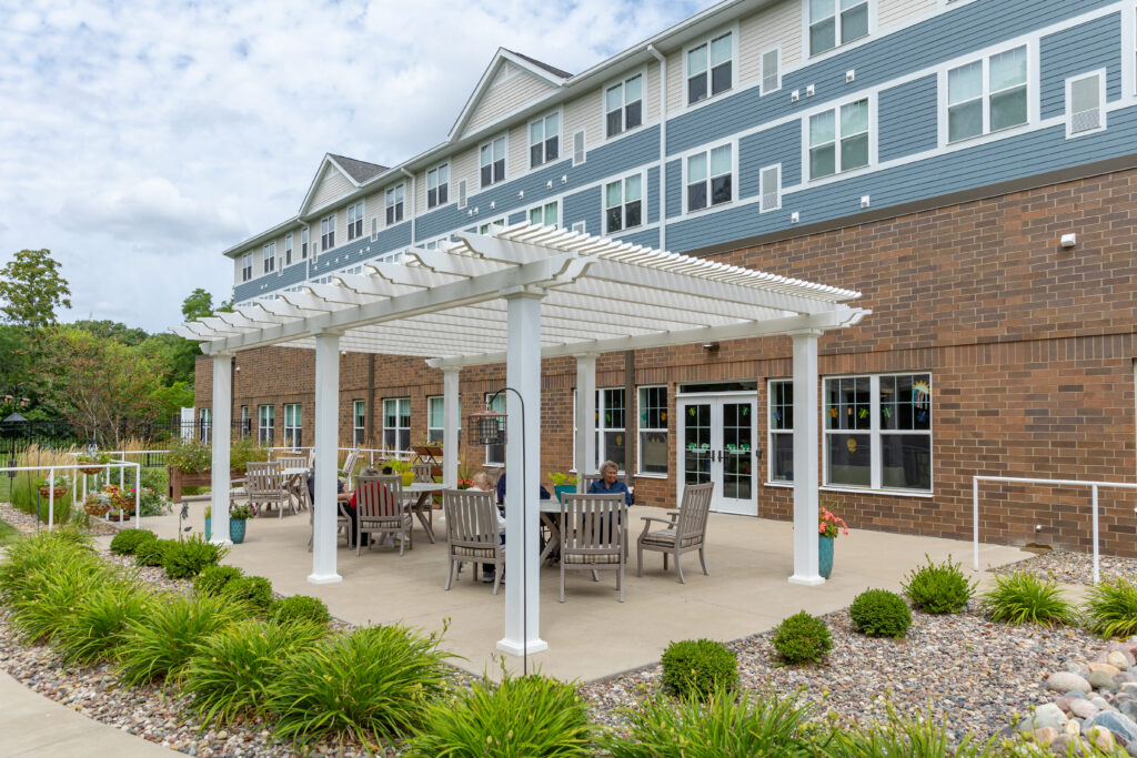Overlook village memory care patio with large shade pergola