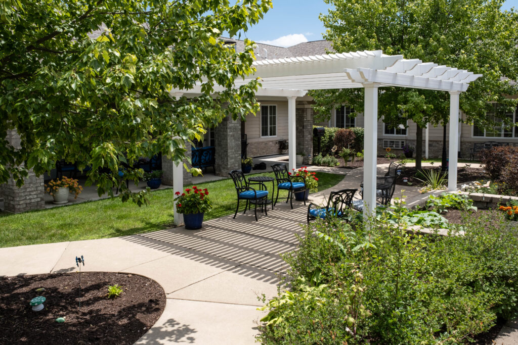 Senior star senior living courtyard with shade pergola