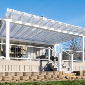 White covered pergola over a large deck