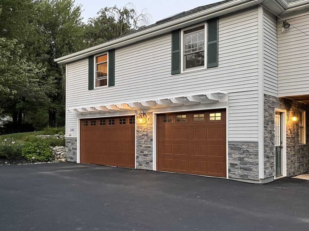 Garage pergola above double garage doors