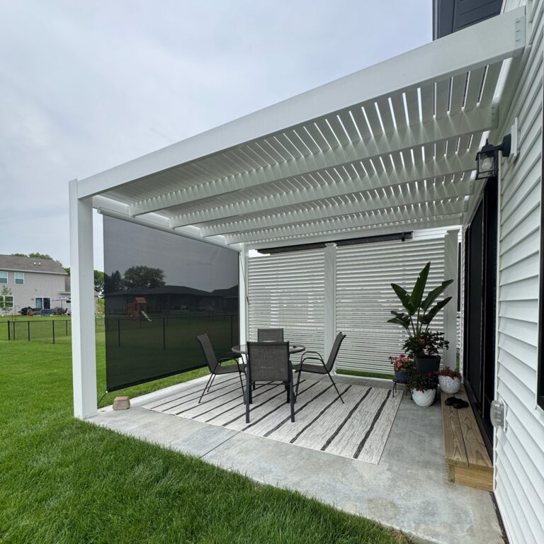 Attached modern pergola with pulldown sunshade and privacy screen