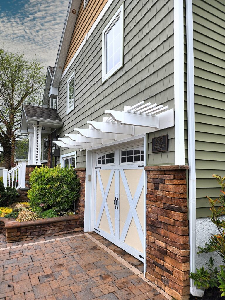 eyebrow pergola over single garage door