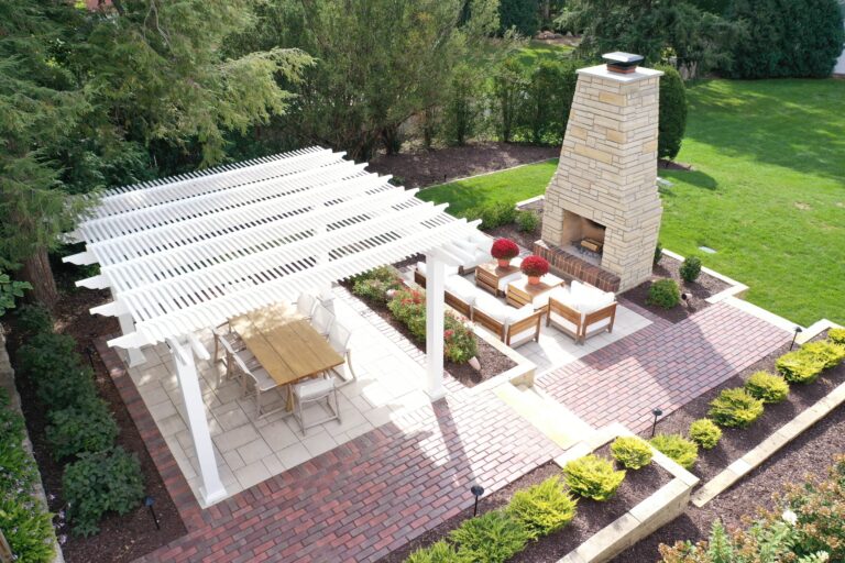Overhead view of a shade pergola on a nicely landscaped back yard