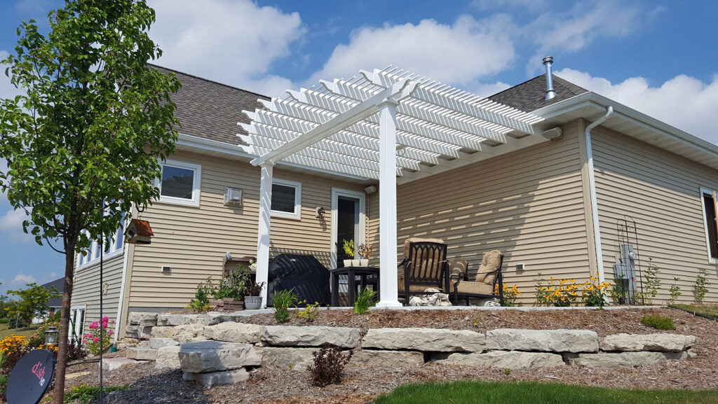 Attached rounded pergola over patio