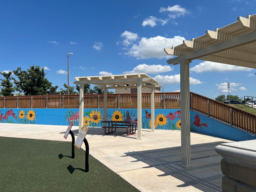 Shade pergolas inside a new playground in Oklahoma