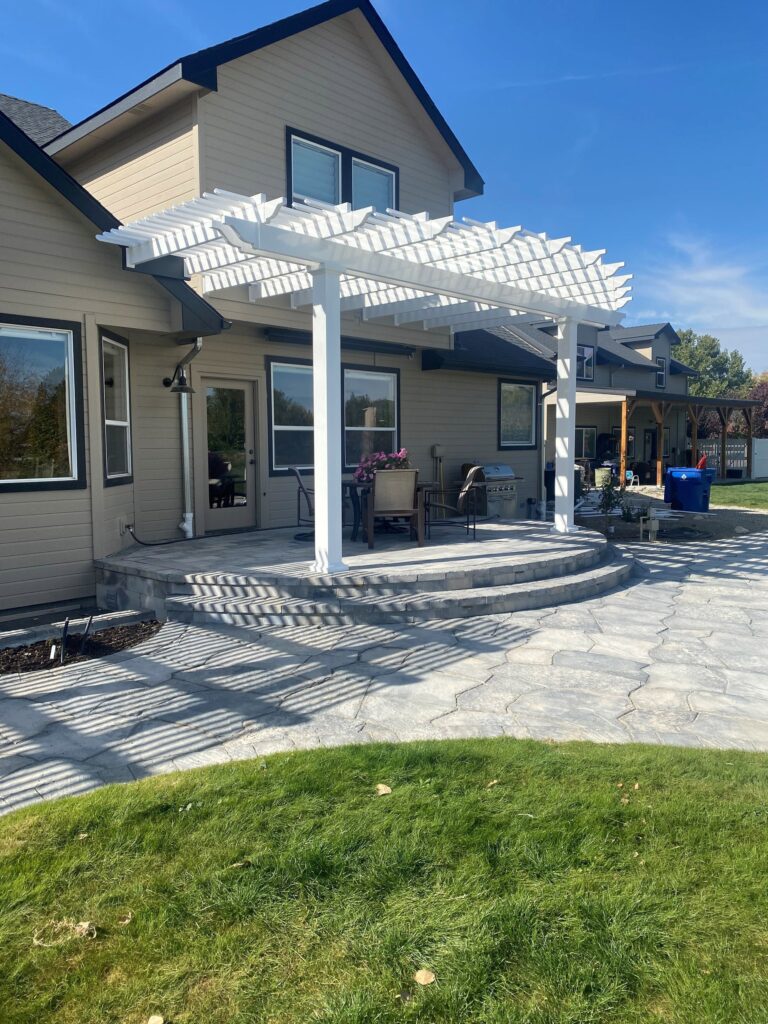 rounded pergola over a rounded patio
