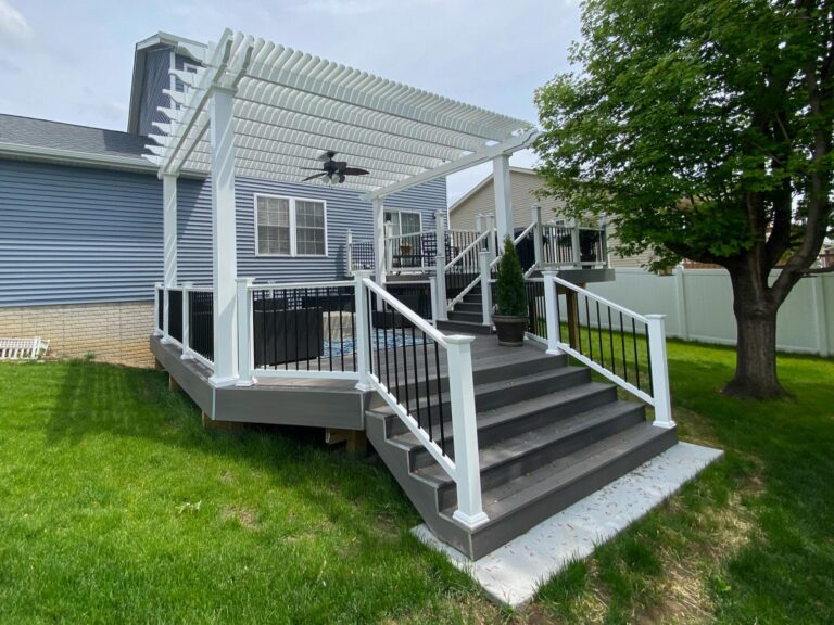 Freestanding shade pergola on a deck with outdoor fan