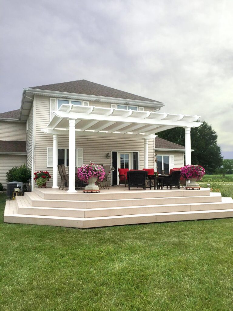 White freestanding pergola over a deck