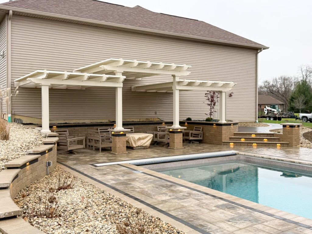 Custom three tier pergola next to pool
