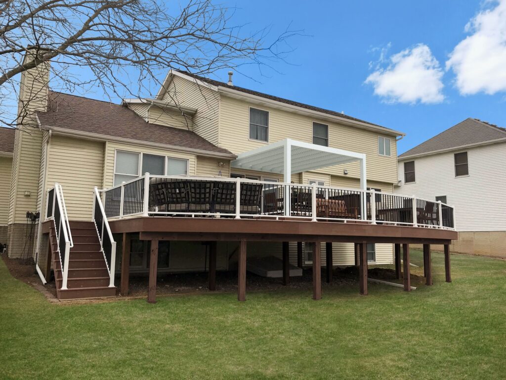 Attached white modern pergola over a deck